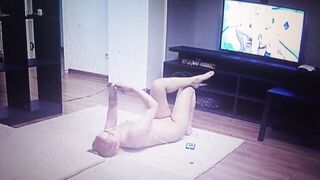 Young couple watching porn movies at home naked