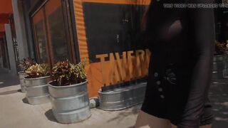 exhibitionist girl shows boobs in public