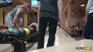 HUNT4K. Money helped hunter score successful strike in bowling bar