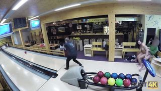 HUNT4K. Money helped hunter score successful strike in bowling bar