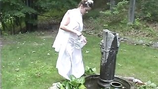 Sexy Toga Wearing Brunette Enjoys Outdoor Foreplay