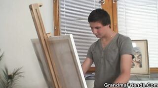 Two young painters bang granny