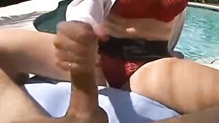 Busty blonde wife jerks off my cock by the pool