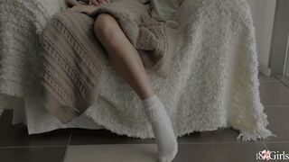Tini reaches into her tight panties to finger