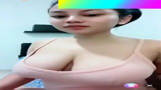 Asian Babe Showing Off Her Big Amazing Tits LIVE