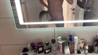 Young couple having fun in the bathroom