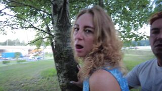 A couple, in plain sight, engaged in extreme sex in a clearing near the road