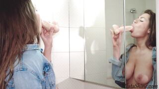 Busty girl with herself in the Bathroom