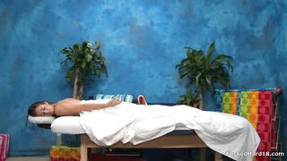 Flexible teen penetrated on massage bed