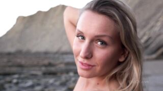 Nude babe morning walk at the ocean shore