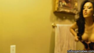 Capri Cavanni changes clothes