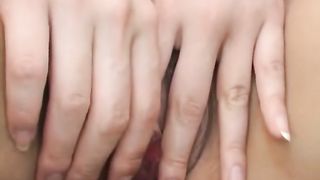 Pretty Asian maid, Natsumi exposes hot pussy for fingering