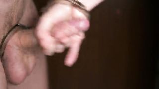 Dick is Handcuffed to a Hand. Sperm Splashes in the Palm. Handjob