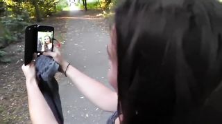 Girl Recieves a Facial in Public Park