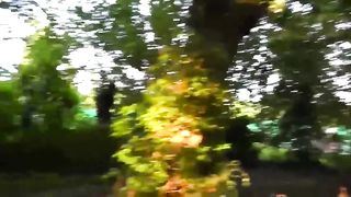 Girl Recieves a Facial in Public Park