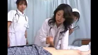 Milf Japan doctor instructs nurses on proper handjob