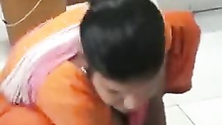 Indian Maid Shows Clevage while Sweeping
