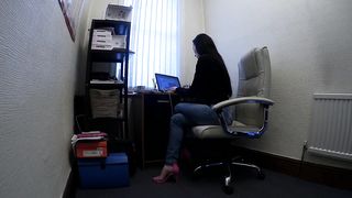 Beautiful Secretary Works from Home in Jeans