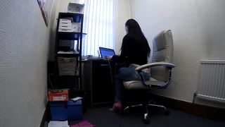 Beautiful Secretary Works from Home in Jeans