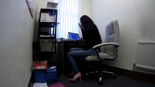 Beautiful Secretary Works from Home in Jeans