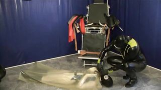 Young Latex Slave Girl in Transparent Rubber Bag with Urine Inhaler