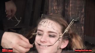 Bdsm babe trapped in a barrel and electrified
